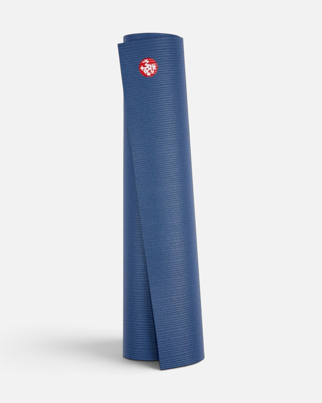 greenyogashop Yogamatte PRO Odyssey in Dunkelblau, zusammengerollt mit rutschfester, geschlossenporiger Oberfläche