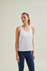 Circular and breathable GOTS certified organic cotton top in Diamond White offering ethical support for yoga, Pilates, and fitness routines